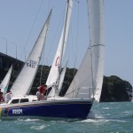 Prism, the most colourful yacht in the fleet, rounds the top mark in the 2003 Stewart Championships (Charles Scoones)